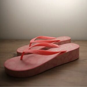 Pink platform Coach sandals
